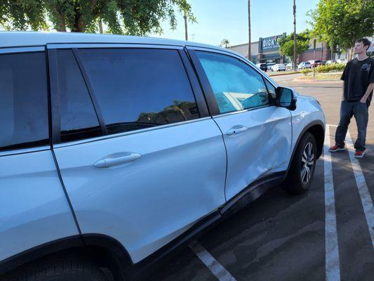 Car Accident photos. Front and rear right side door damaged and the right side air bag got deployed