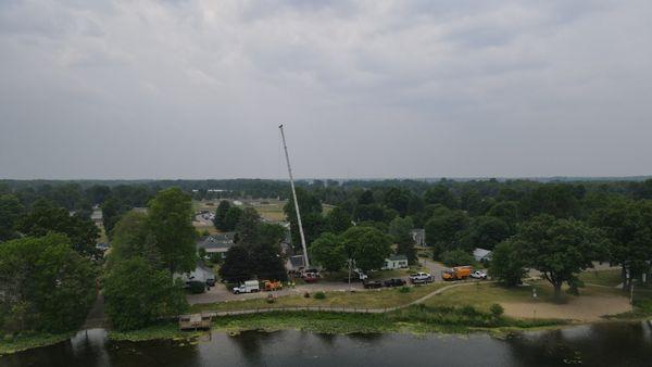 110 ton crane with 175' of reach needed for a large maple extraction from behind home in tight zone.