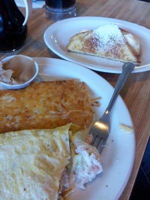 Awesome Seafood omelet with hashbrowns and French toast