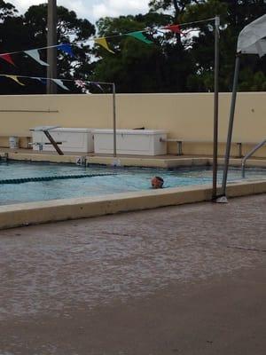 Swimming the whole length of the pool at 4 years old!