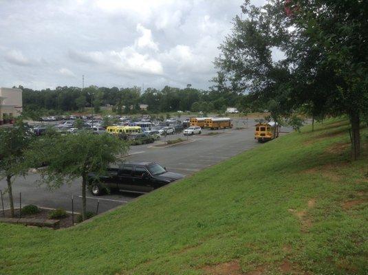 3 Okaloosa County Public School busses and 3 child care business busses at free kids movies