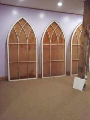 Tenant found these old windows in a church and wanted them installed into this wall,