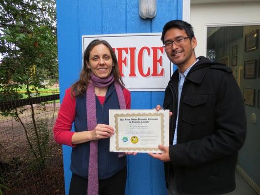 Owner Kate receiving Sonoma County Green Business certification.