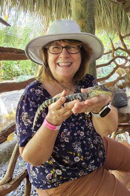 Susie with her baby alligator!