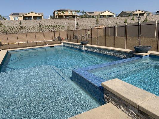 Beautiful pool with tanning ledge and massive 10x10 spa