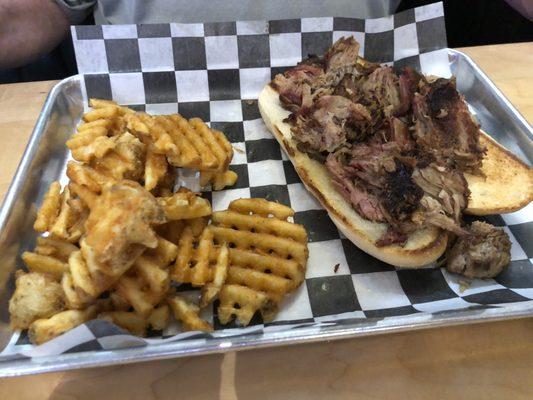 pulled pork sandwich with waffle fries