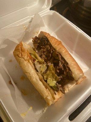 Half of a cheesesteak with the works!!!