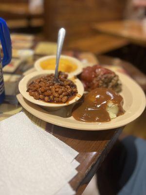 Meat loaf, mashed potatoes, baked beans, peaches