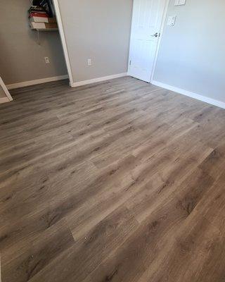 Vinyl planks and baseboards