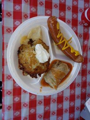 Potato Cake, cabbage roll, and sausage (perogie and applesauce barely visable under the cake)