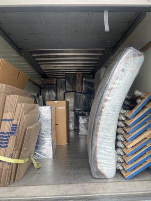 Organized, protected, and stacking the truck so your belongings make it to your destination in timely and safe manner.