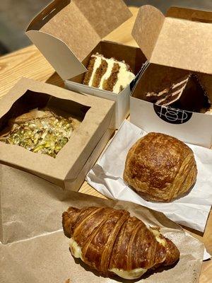 Potato and leek galette, chocolate croissant, the Drew sandwich on a croissant, carrot cake, and espresso chocolate cake