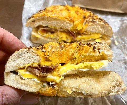 Bacon egg and cheese on jalapeño cheddar everything bagel - nice egg inside