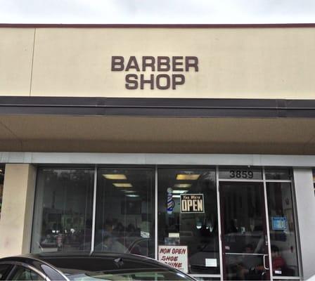 View of the Braes Heights Barber Shop from the parking lot outside. It's not fancy but the service is great!