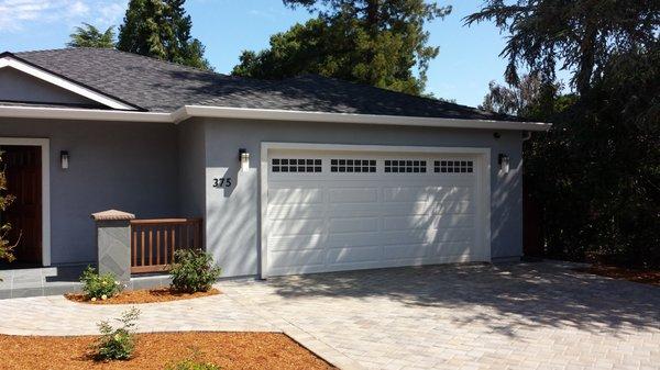 Insulated raised panel steel garage door