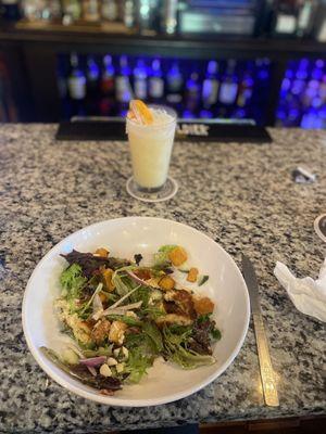 House salad with Crab cakes and a Pina-Colada type drink