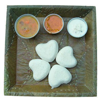 Millet Idlis with sides of Sambar (Jain-friendly but contains carrots), Coconut Chutney and Tomato Chutney