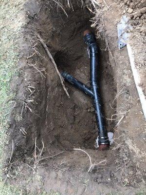 Before lining our main sewer, James & Alex reattached a line going out to the garage that had been cut off years ago.