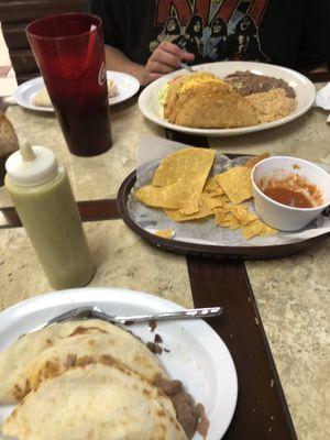 Crispy taco plate and bean and cheese taco , carne asada taco