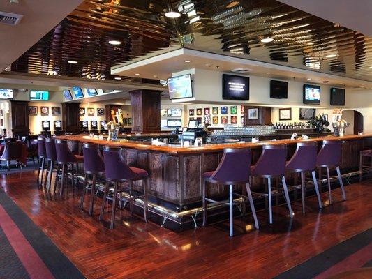 The large horseshoe shaped bar in the Vessels Club at Los Alamitos