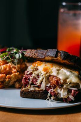 TONY'S RUEBEN
 
 Corned Beef, Secret Sauce, Sauerkraut, Caramelized Onion, Bacon, Swiss, on Toasted Rye