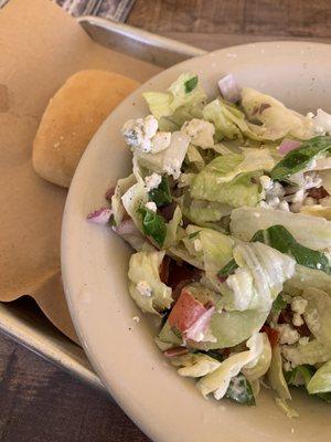 Side salad with blue cheese and blue cheese crumbles. Fresh and tasty.