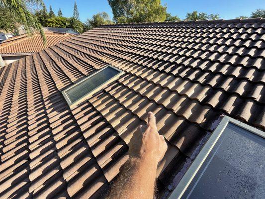 Observed discoloration of roof tile. Evidence of tile repair.