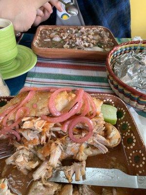 Torta ahogada and carne en su jugo