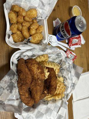 Chicken strips, waffle fries, cheese curds and Pepsi.