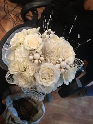 Vintage jewelry in a wedding bouquet