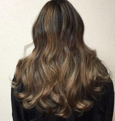 Cool brown balayage on black hair.