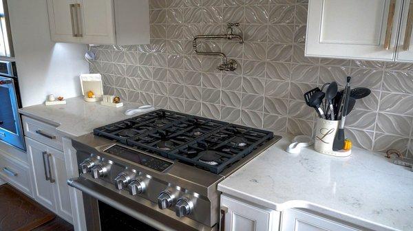 White Quartz Countertops with Stove.