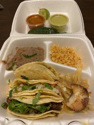 Taco plate combo with rice & beans.   Those onions and potato were amazing!