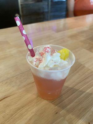 Flamingo Sour with whipped cream and sprinkles