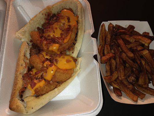 Westerner hot sub (burger, bacon,fried onions,bbq sauce,& cheddar cheese) & small fries