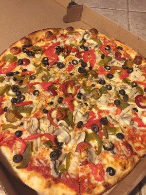 Large veggie pizza with hot peppers: the bomb!