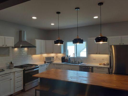 Kitchen remodel. Added wafer lights, under cabinet lights, and down lights.