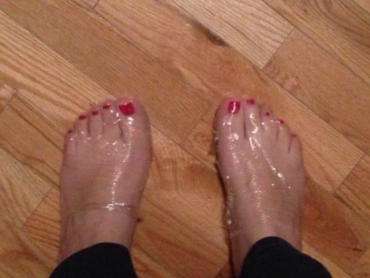 They Saran-wrapped my feet so my socks couldn't destroy the nail polish! Genius!