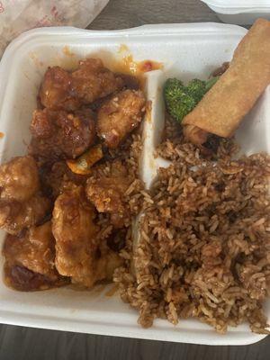 Orange chicken, egg roll, fried rice