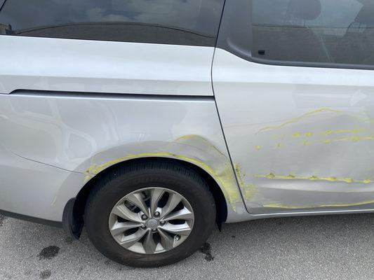 Damaged vehicle by service worker