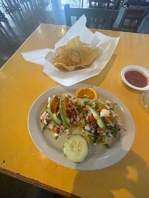 Two ceviche tostadas. Shrimp @ pulpo excellent. Doesn't look like a lot, but I was so full after... super sweet ladies working here too