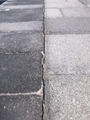 Cracks/separation between most if not many pavers