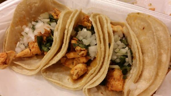 Chicken tacos on corn tortillas