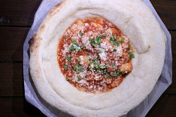 Gnocchi alla Bolognese served in our unique pizza bowl.