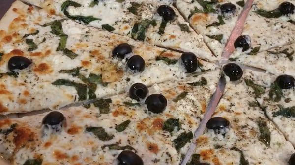 Casero's White pie with fresh spinach and black olive. Yum!!