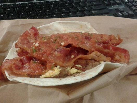 Flour Tortilla, Refried Beans, Scrambled Eggs, 5 pieces Bacon & Hot Red Salsa chased by a Ken's Donut & Black Coffee. GREAT !