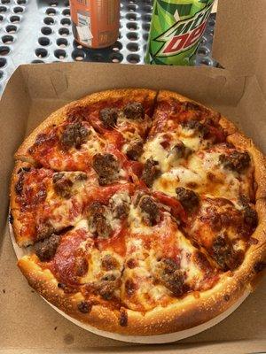 Pizza with pepperoni and hamburger.