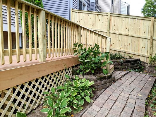 Brand new privacy fence as well as a reinforced and resurfaced deck with composite boards.