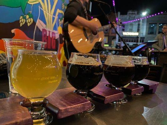 Beer flight, sitting out on the patio listening to live music