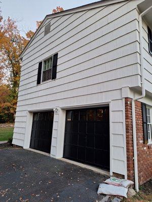 They suggested going from white to black garage doors. Love it!